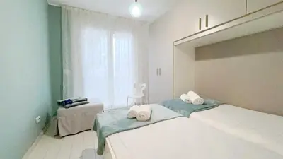 Letto o letti in una camera di Casa Helios by Ca-Sa Check