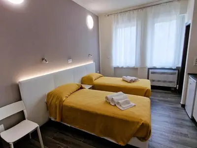Letto o letti in una camera di Berica Alloggi Turistici
