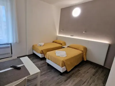 Letto o letti in una camera di Berica Alloggi Turistici