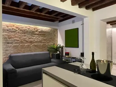 Area soggiorno di VENICELOFT 5minutefromRialto 10minutefromSanMarco 5minitestationTrain infrontofCaD'ORO