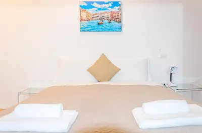 Letto o letti in una camera di Bella Venezia