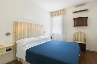 Letto o letti in una camera di Appartamento Garibaldi