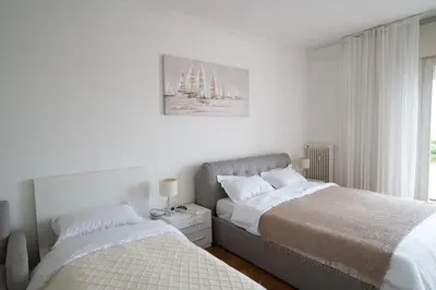 Letto o letti in una camera di Venice Home Mestre FS free parking