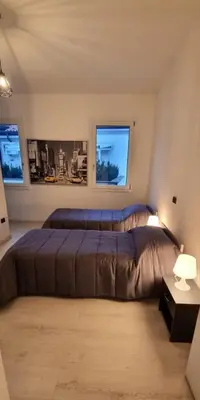 Letto o letti in una camera di Charme Padovano con Terrazza