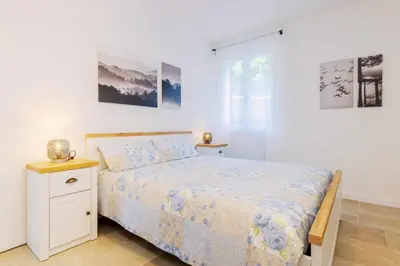 Letto o letti in una camera di Elegante Appartamento con Vista - Colli Euganei