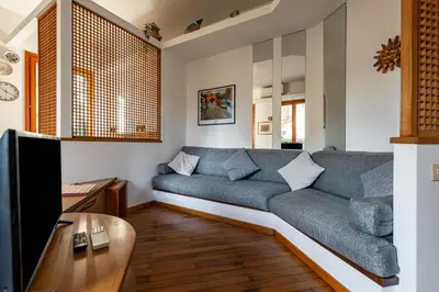 TV o dispositivi per l'intrattenimento presso GuestHost - Cozy 2-Bedroom Stay at Lido di Venezia