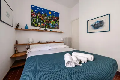 Letto o letti in una camera di GuestHost - Cozy 2-Bedroom Stay at Lido di Venezia