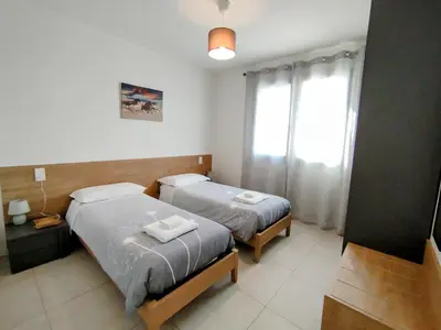 Letto o letti in una camera di Appartamento ROVERE