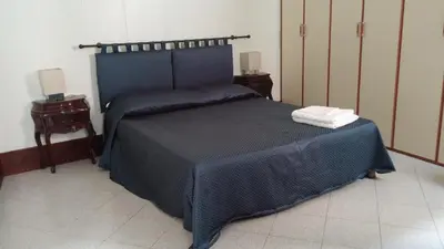 Letto o letti in una camera di Appartamento Corte Zappa