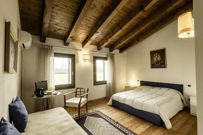 Letto o letti in una camera di Bed and Breakfast Sile e Natura
