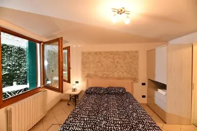 Letto o letti in una camera di San Marco Wi-Fi
