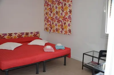 Letto o letti in una camera di B&B La Via dell'Ambra