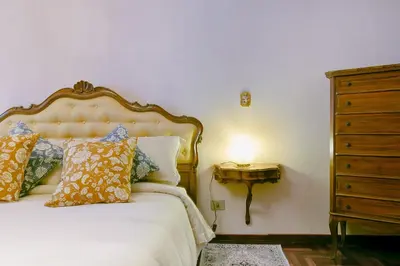 Letto o letti in una camera di QUEEN HOME Gabrielle