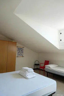 Letto o letti in una camera di Dainese Apartments, Casa Ester