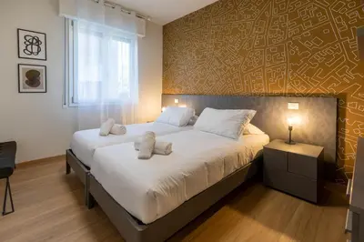 Letto o letti in una camera di Riviera MIANI 1