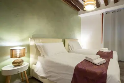 Letto o letti in una camera di VeNICe Cera Ca' De La Mandola