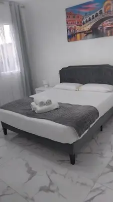 Letto o letti in una camera di Casa Riviera del Brenta