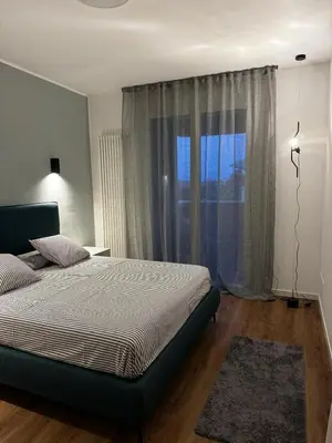 Letto o letti in una camera di Splendido Attico fuori mura