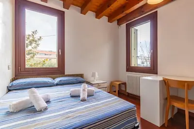 Letto o letti in una camera di GuestHost - Space & Comfort Ideal Retreat Mestre