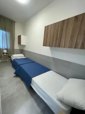 Letto o letti in una camera di Renovated two bedroom flat in Rosolina Mare