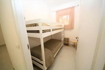 Letto o letti in una camera di Renovated two bedroom flat in Rosolina Mare
