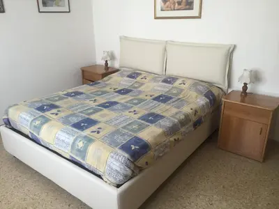 Letto o letti in una camera di Due Camere, Vicino al Mare, CONDOMINIO RIO