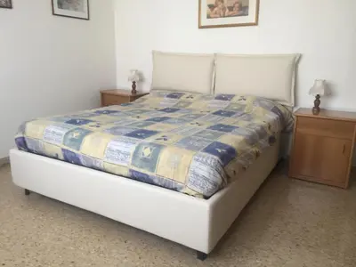 Letto o letti in una camera di Due Camere, Vicino al Mare, CONDOMINIO RIO