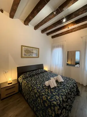 Letto o letti in una camera di Cozy apartment close to Biennale of Venice