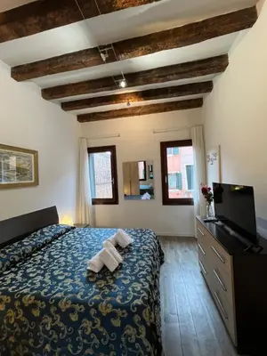 Letto o letti in una camera di Cozy apartment close to Biennale of Venice