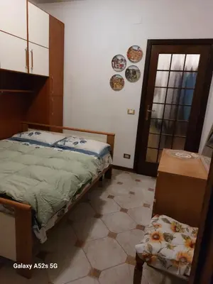 Letto o letti in una camera di # Punto FM 8#