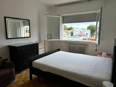 Letto o letti in una camera di Venice Next Door
