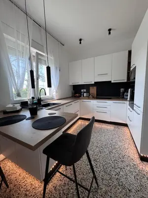 Cucina o angolo cottura di Pineta Apartment with Exclusive Pool