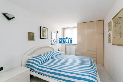 Letto o letti in una camera di Condominio London