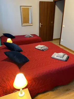 Letto o letti in una camera di Bella Meimei