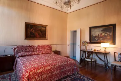 Letto o letti in una camera di Camera doppia con bagno e terrazza