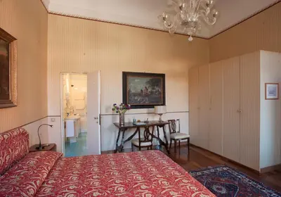 Letto o letti in una camera di Camera doppia con bagno e terrazza