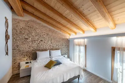 Letto o letti in una camera di Borgo Paolin - Camere in vigna