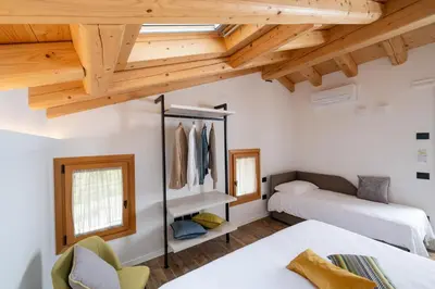 Letto o letti in una camera di Borgo Paolin - Camere in vigna