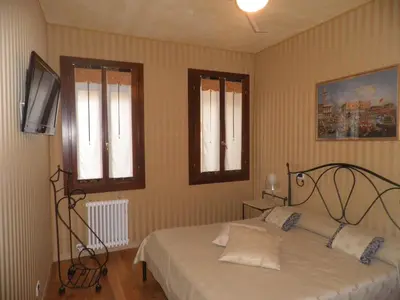 Letto o letti in una camera di Ca' Delle Maschere