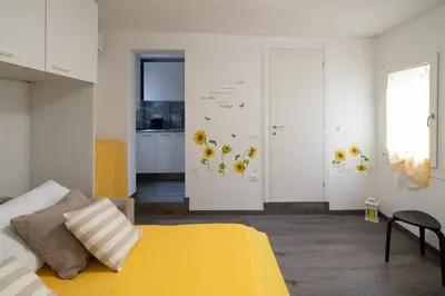 Letto o letti in una camera di Girasole