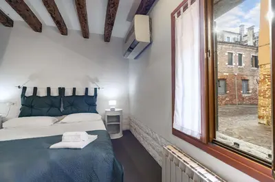 Letto o letti in una camera di Ca' Nova II by Wonderful Italy