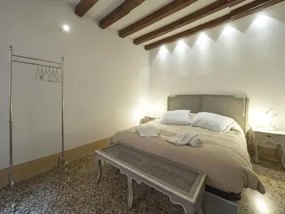 Letto o letti in una camera di Casa Margherita by Wonderful Italy