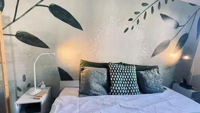 Letto o letti in una camera di Wisteria Apartment