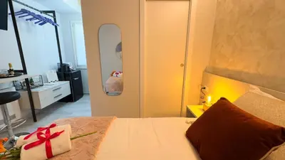 Letto o letti in una camera di Do Campanili by Ca-Sa Check