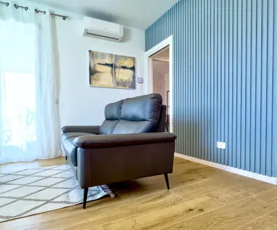 Area soggiorno di 20 min Venezia Modern Apartament with terrace