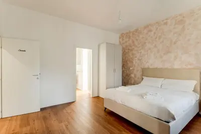 Letto o letti in una camera di GuestHost - Padova living Experience - Diamante Apartment, Rubino Room and Smeraldo Room