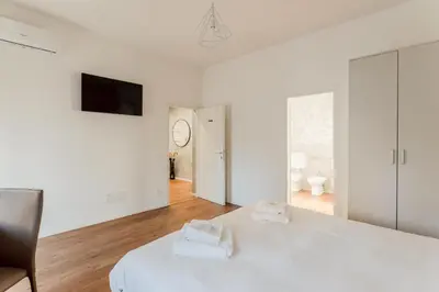 Letto o letti in una camera di GuestHost - Padova living Experience - Diamante Apartment, Rubino Room and Smeraldo Room
