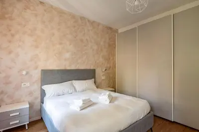 Letto o letti in una camera di GuestHost - Padova living Experience - Diamante Apartment, Rubino Room and Smeraldo Room
