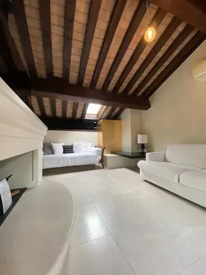 Letto o letti in una camera di - Cuddly House - Centro Storico Bassano