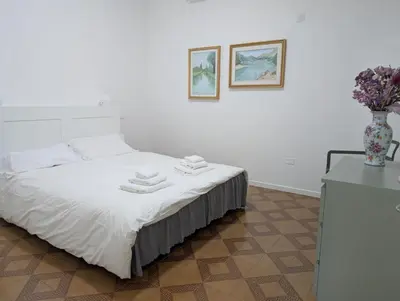 Letto o letti in una camera di Casa Dimatore
